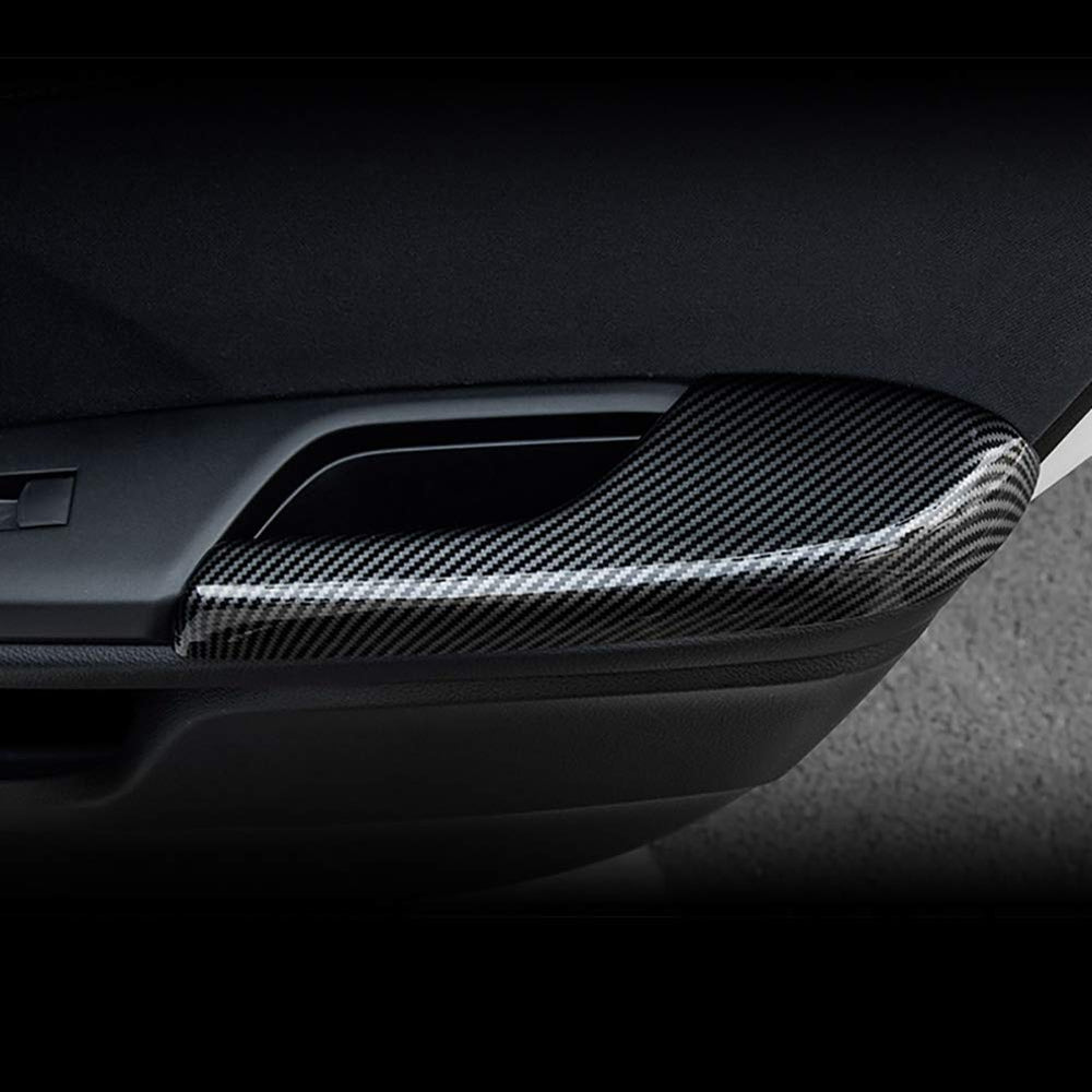 Phoneix ABS door trim with carbon texture protects handles from dust.