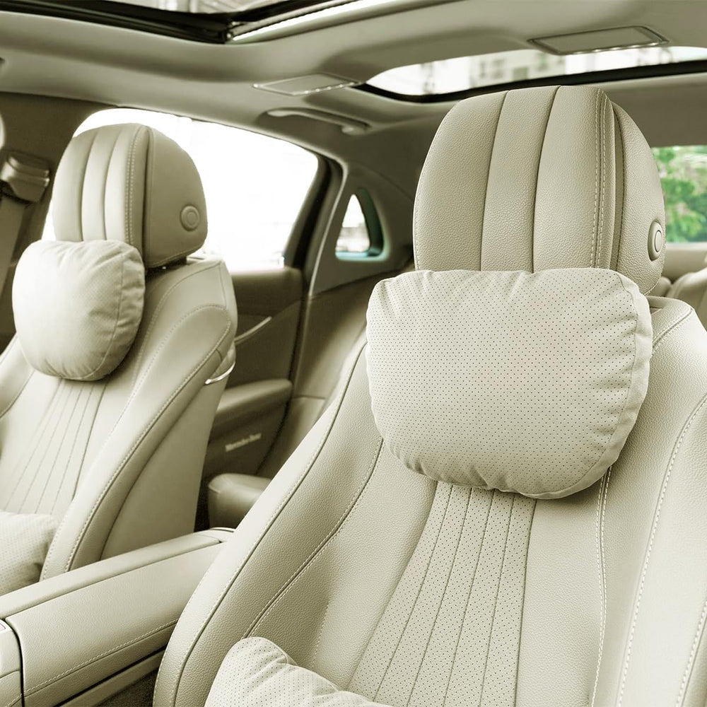 Phxoinu car headrest pillow with soft suede cover for comfortable long drives.