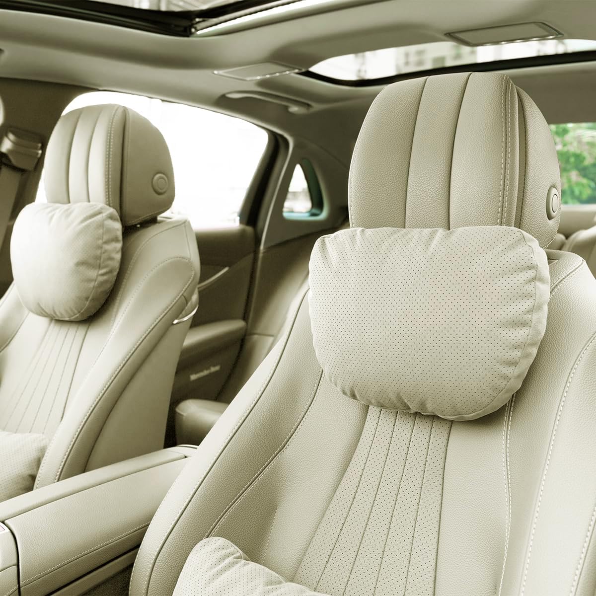 Phxoinu car headrest pillow with soft suede cover for comfortable long drives.