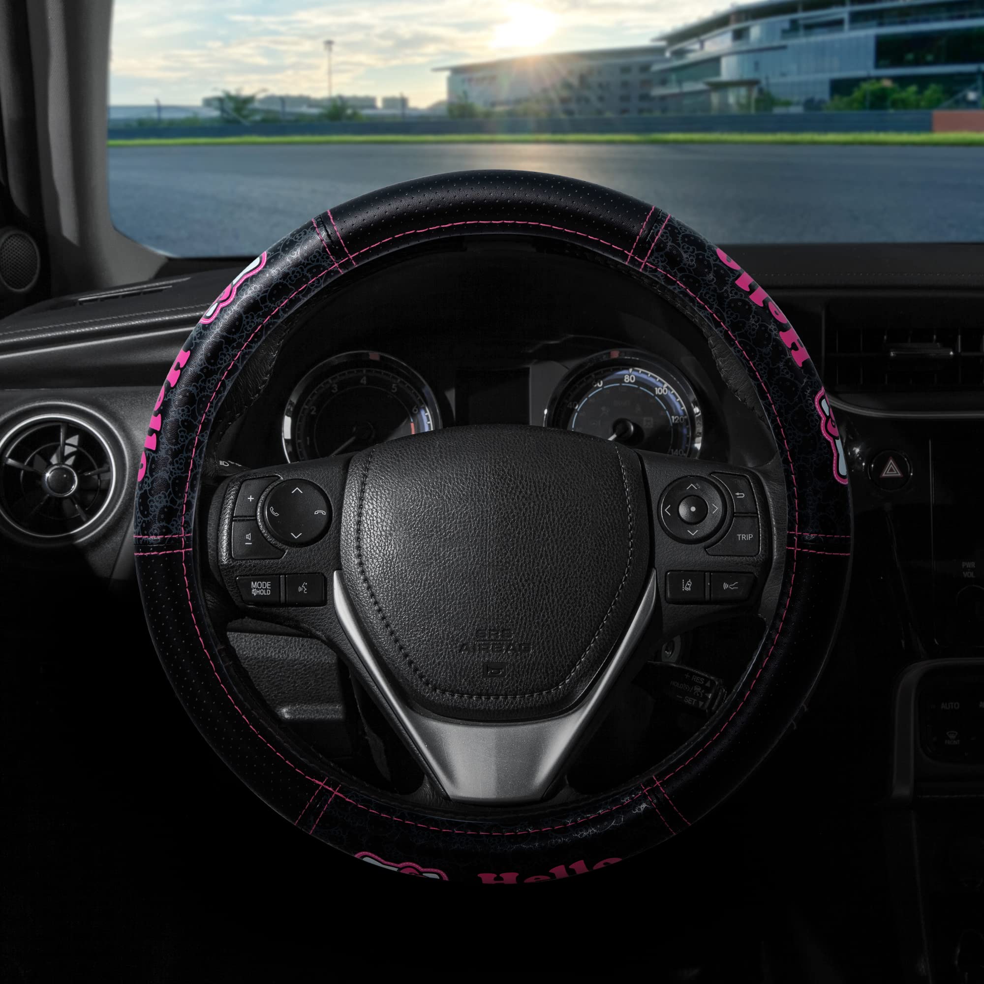 Official Sanrio licensed Plasticolor Hello Kitty wheel cover packaging emphasizes easy install and leather-like feel