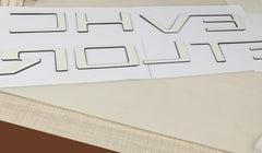 POSPICE tailgate letters during installation step-by-step guide for clean, glossy results.