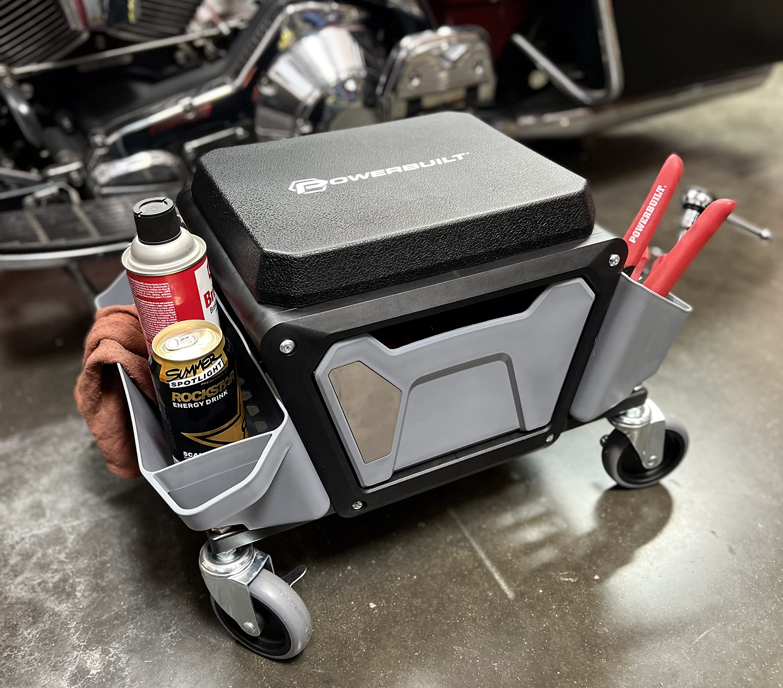 Powerbuilt brake stool with lockable wheels for stable positioning.
