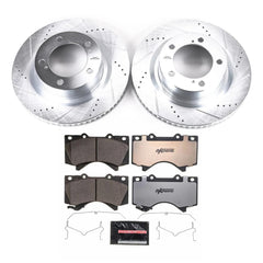 Front brake rotors drilled and slotted for enhanced cooling and consistent braking