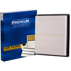 Premium Guard PA99365 engine air filter in a Subaru Forester for cleaner intake air.