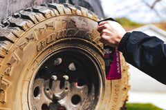 Mud Buster applied to dirt bike underbody for grime removal