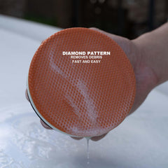 PUMBAA HOME clay pad being rinsed to show reusable design