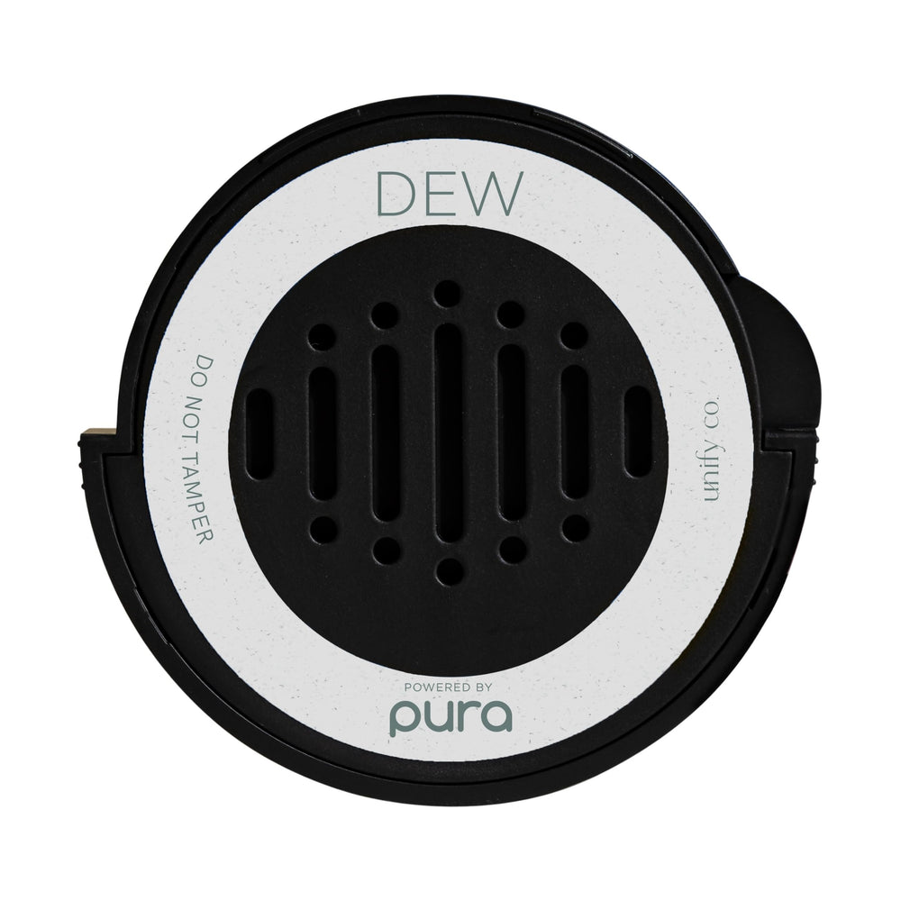 Pura car diffuser refill showing white tea and bergamot notes for a fresh cabin scent.