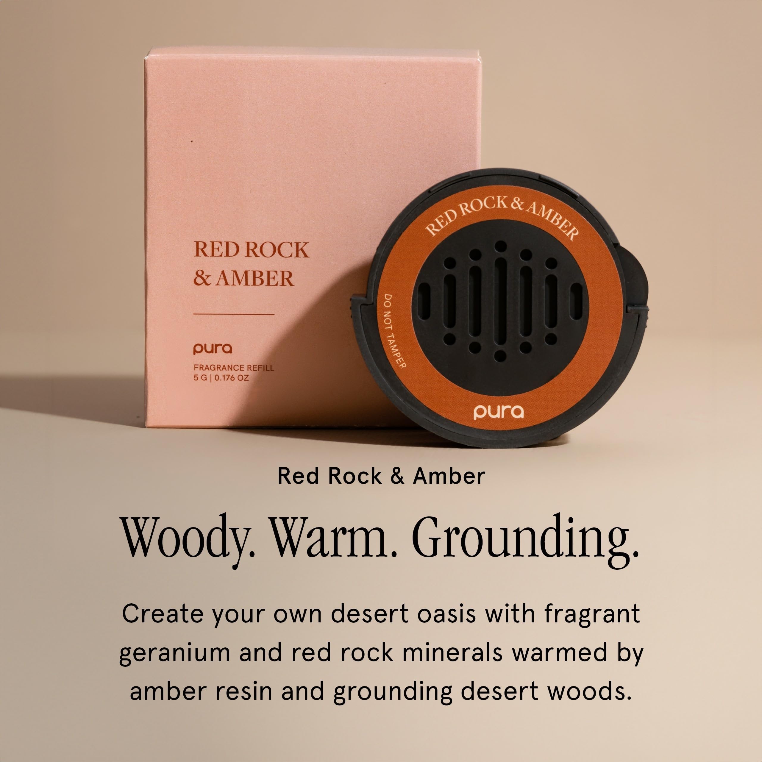 Pura car scent refill with geranium and amber resin for woody ambience.