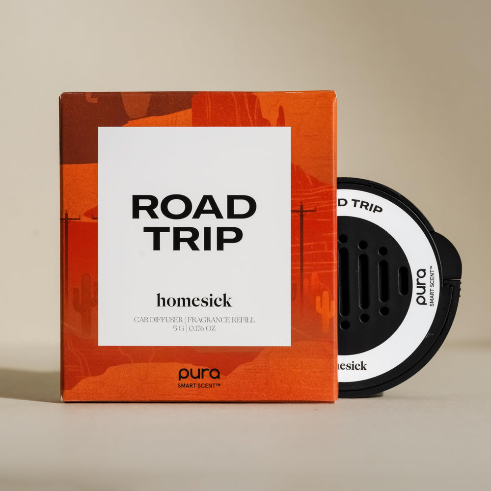 Pura Homesick car diffuser refill bottle on display for convenient use.