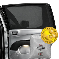 Qualizzi L/Car Shades mounted on a window showing full edge-to-edge coverage