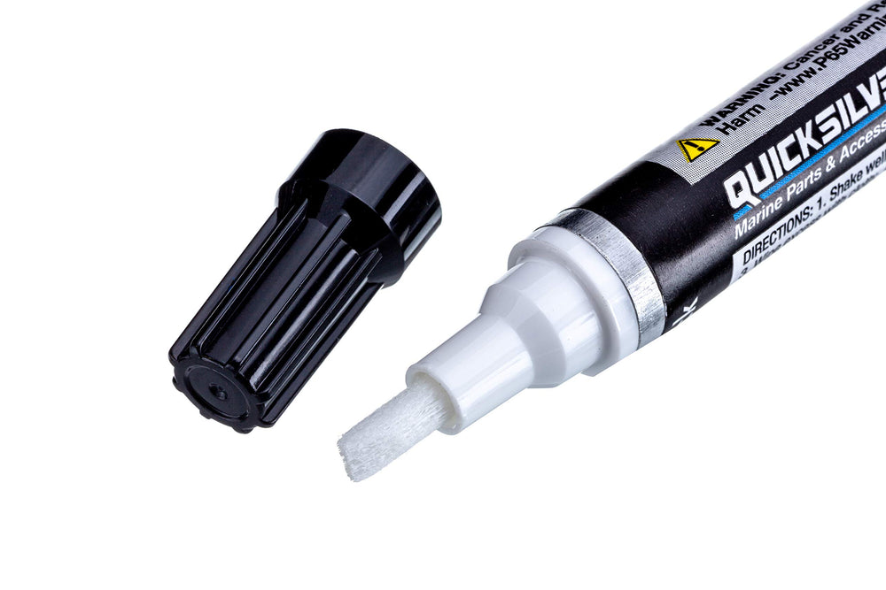 Quicksilver Phantom Black paint pen applying touch-up on chipped surface