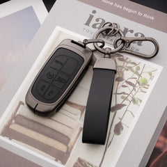 Qunzes challenger fob cover metal leather blend protects function in daily use.
