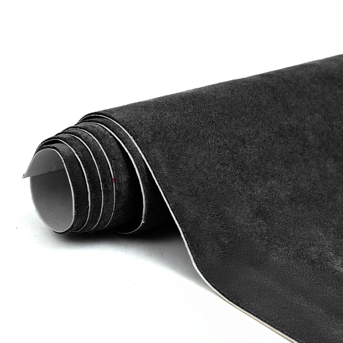 RadiantDecor premium black suede wrap close-up texture for luxurious car interior.