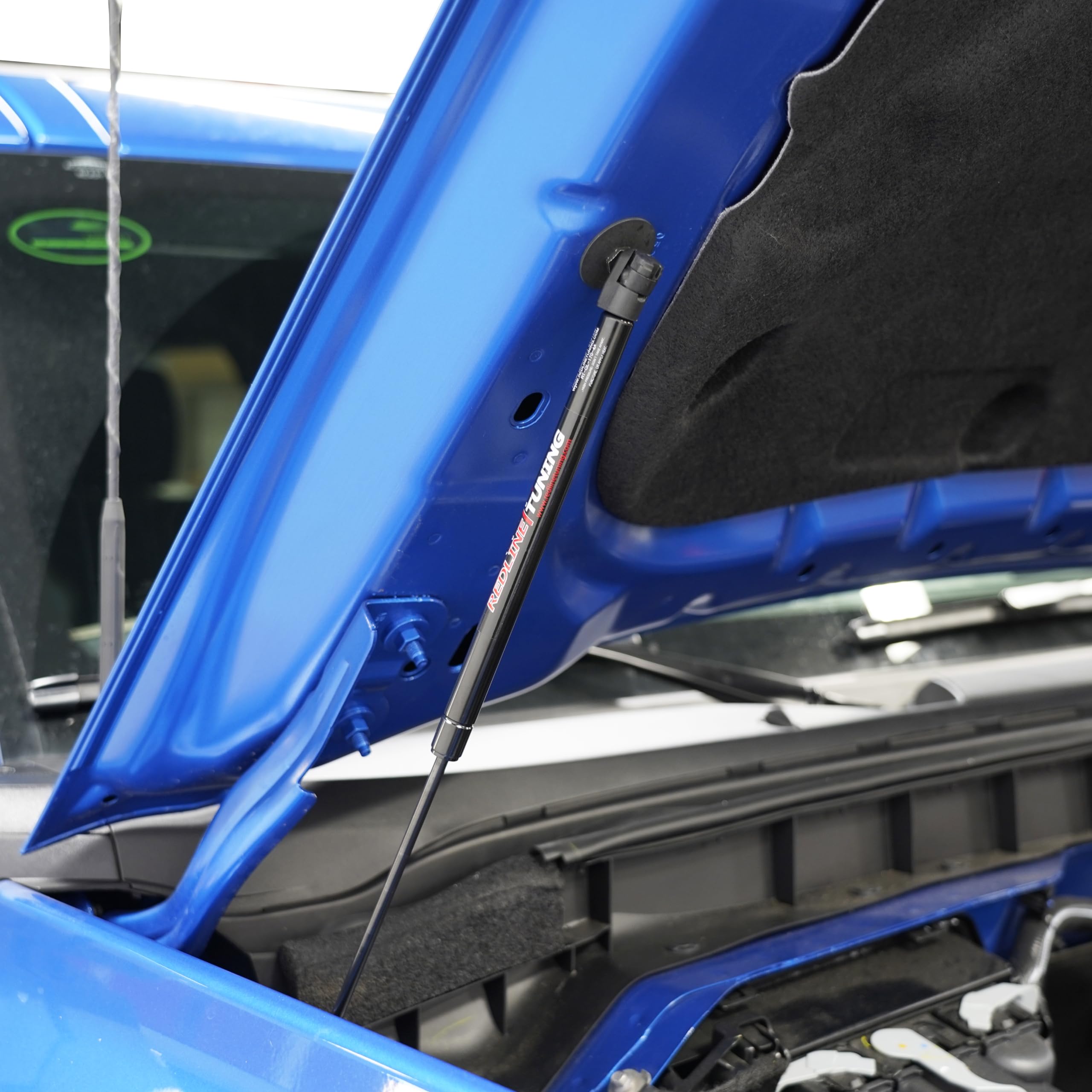 Engine bay after Maxlift Plus installation shows clean view.