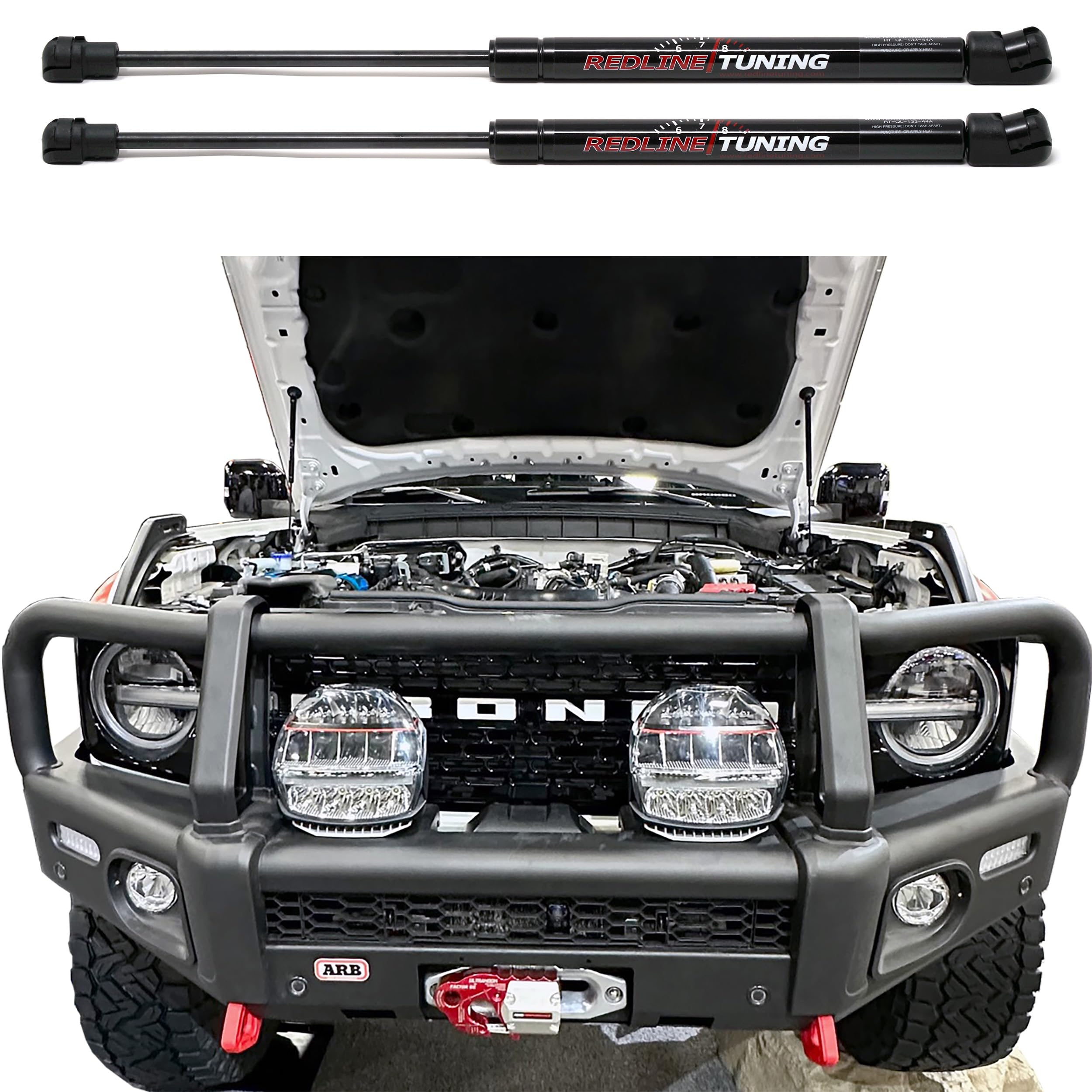 Black gas springs from Redline Tuning for smooth hood lift.
