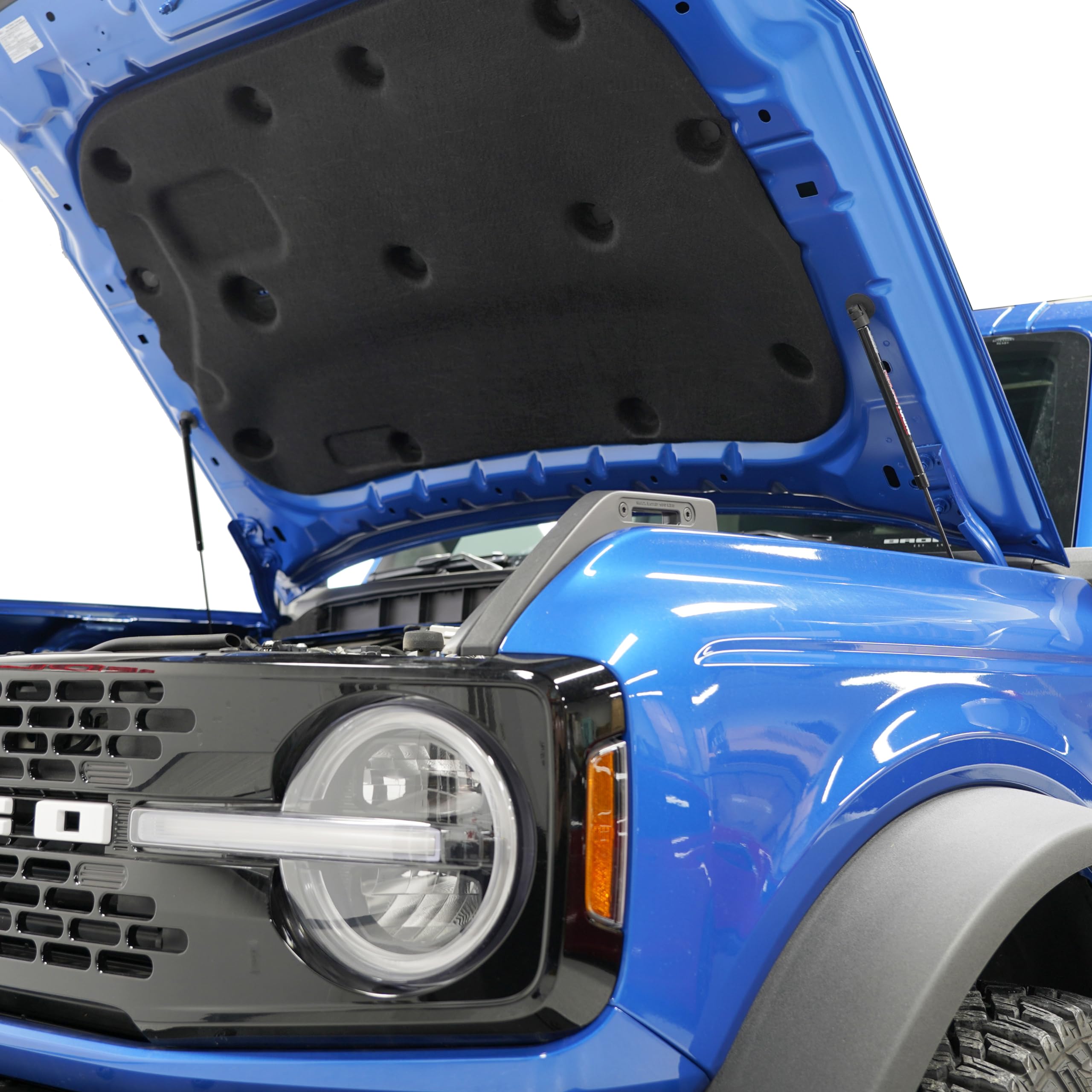 Hood mount hardware zinc plated and black-coated by Redline Tuning.