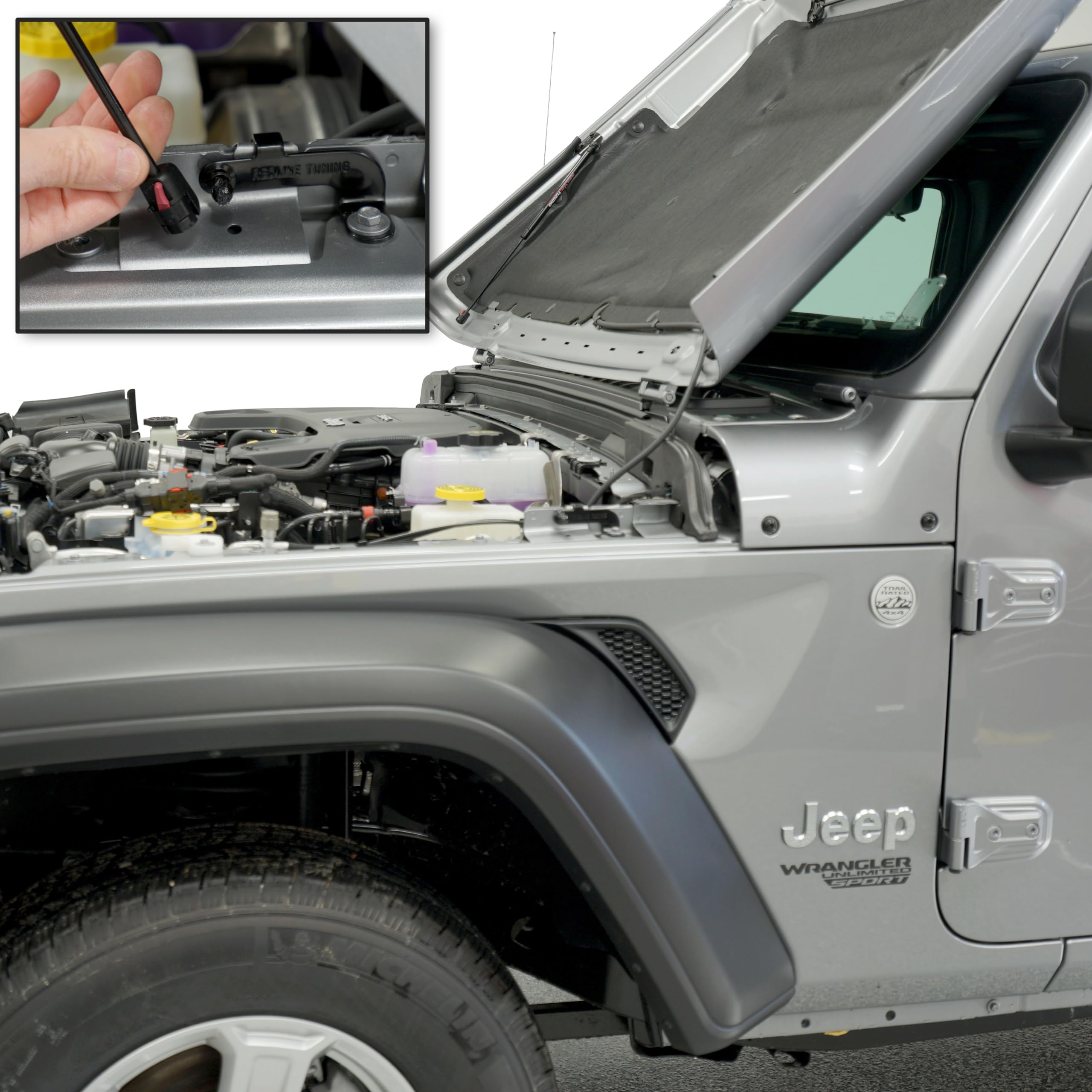 Quick-release lower attachments demonstrate easy hood detachment from gas struts.