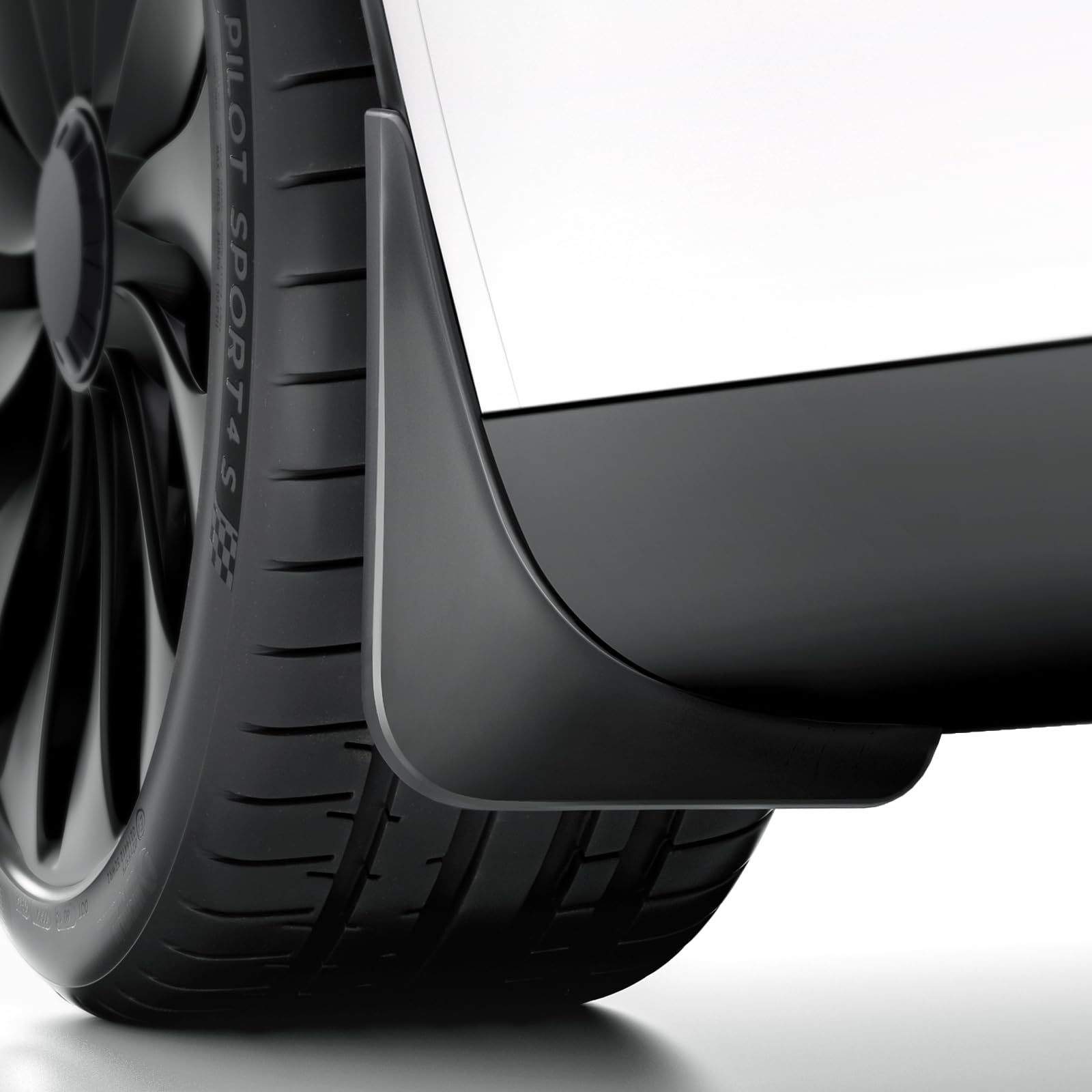 REEVAA Model X mud flap front-left protects paint from gravel and mud.