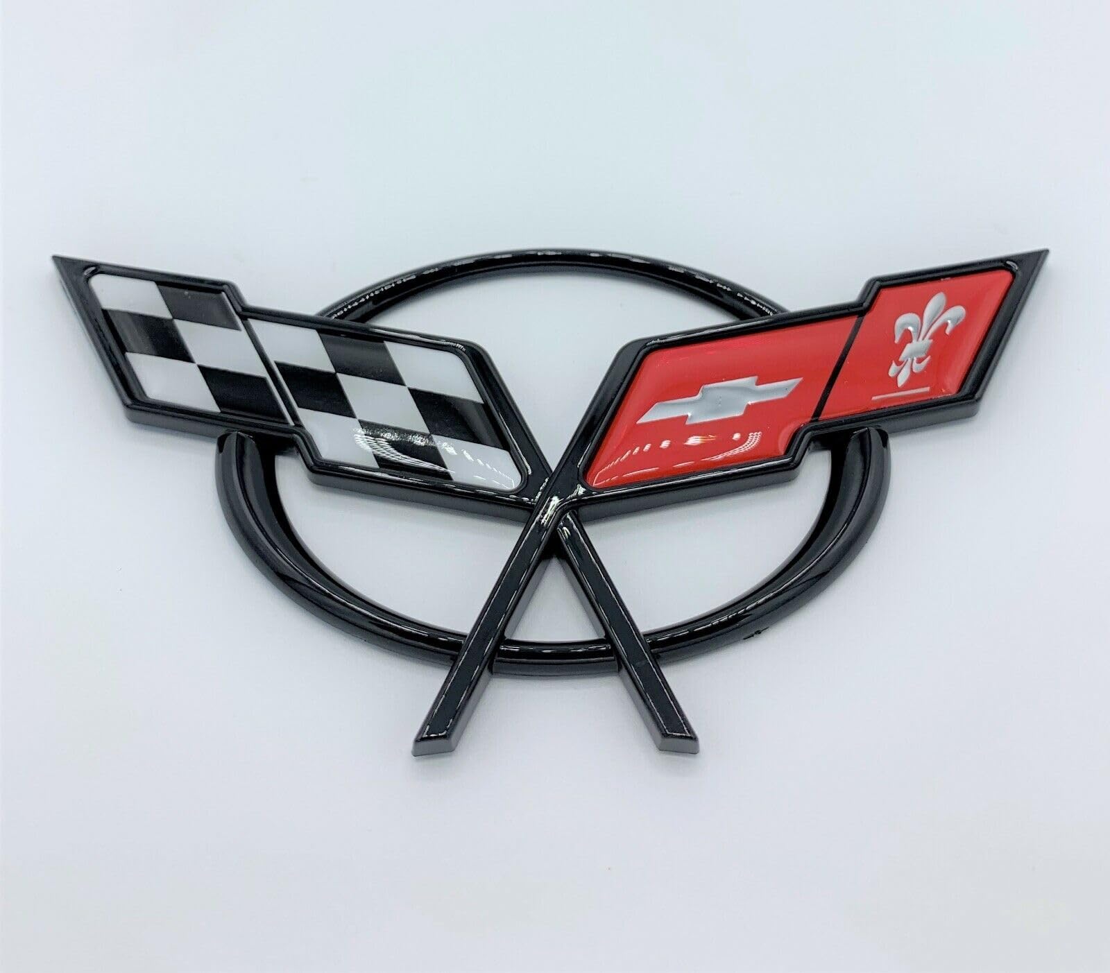 REIXS adhesive-backed emblem for quick, hassle-free installation.
