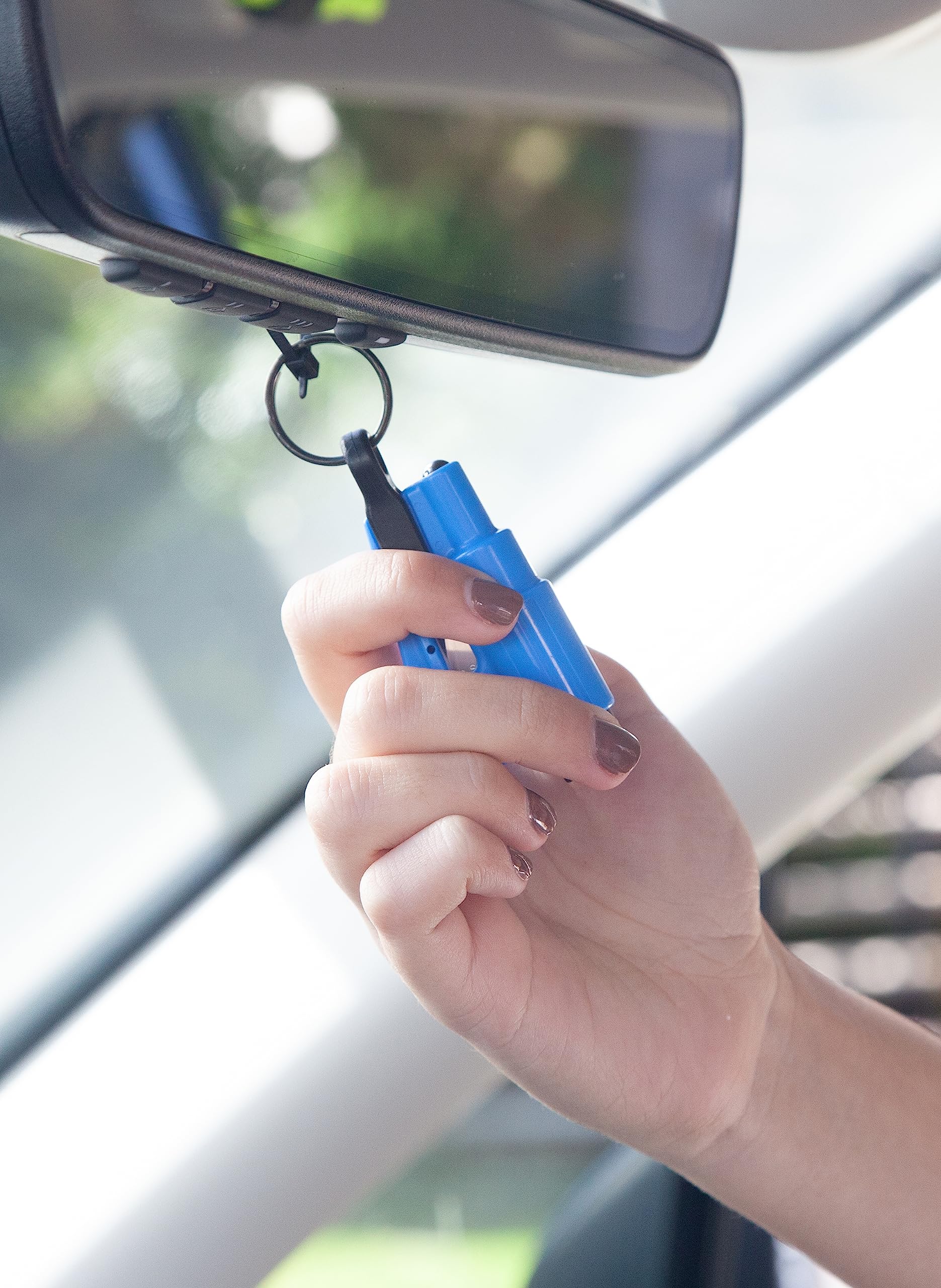 RESQME seatbelt cutter diagonally cuts jammed belt for faster escape.