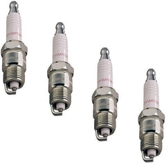 RICEFINE Champion Copper Plus 415 spark plug close-up shows durable brass core.