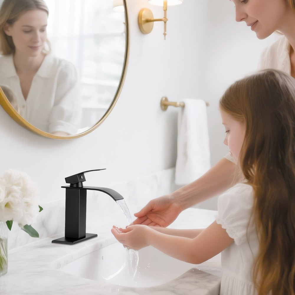 RNDIOZD matte black faucet installed with deck plate for 1- or 3-hole sinks