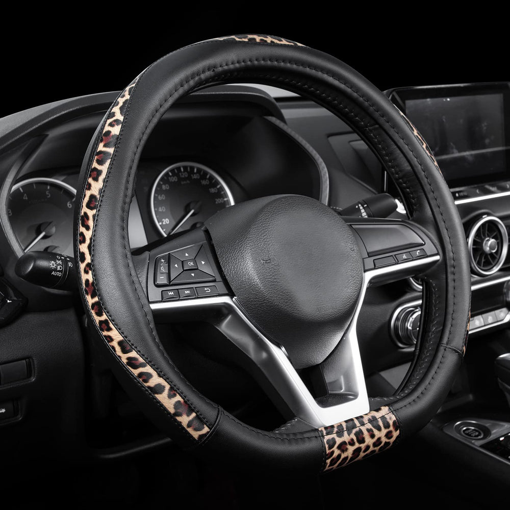 Road Comforts D-Type leopard front view steering wheel cover enhances grip and style.