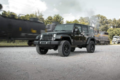 Rough Country 2.5-inch lift kit installed on a Jeep Wrangler JK Unlimited for off-road confidence.