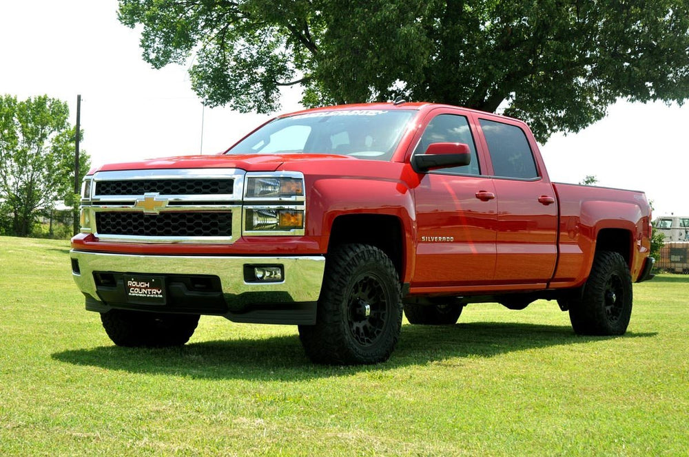 Rear-on-truck view of Rough Country 2-Inch leveling kit enhances alignment and ride height.