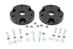 Rough Country 2-Inch Leveling Kit front strut detail showing a leveled stance