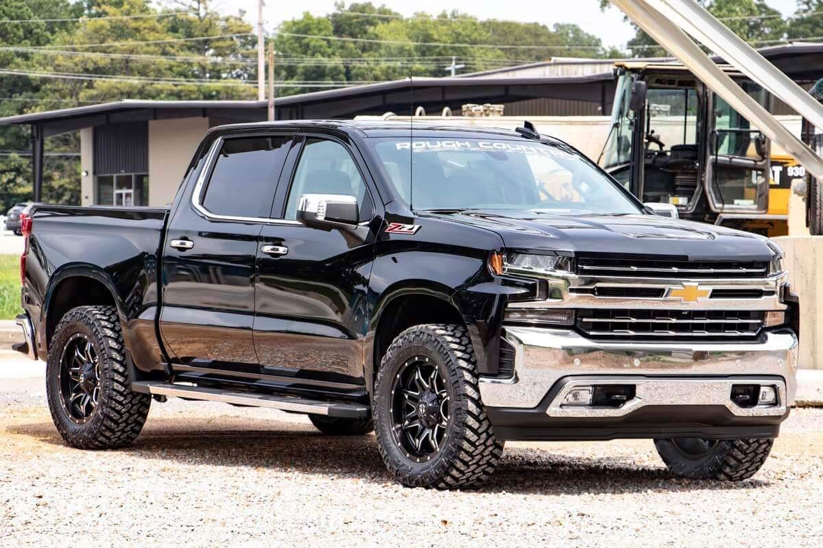 Truck equipped with Rough Country 2-Inch Leveling Kit on the front