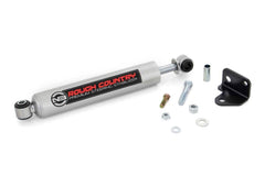 Rough Country N3 stabilizer during installation on a Jeep Wrangler JK for improved steering control