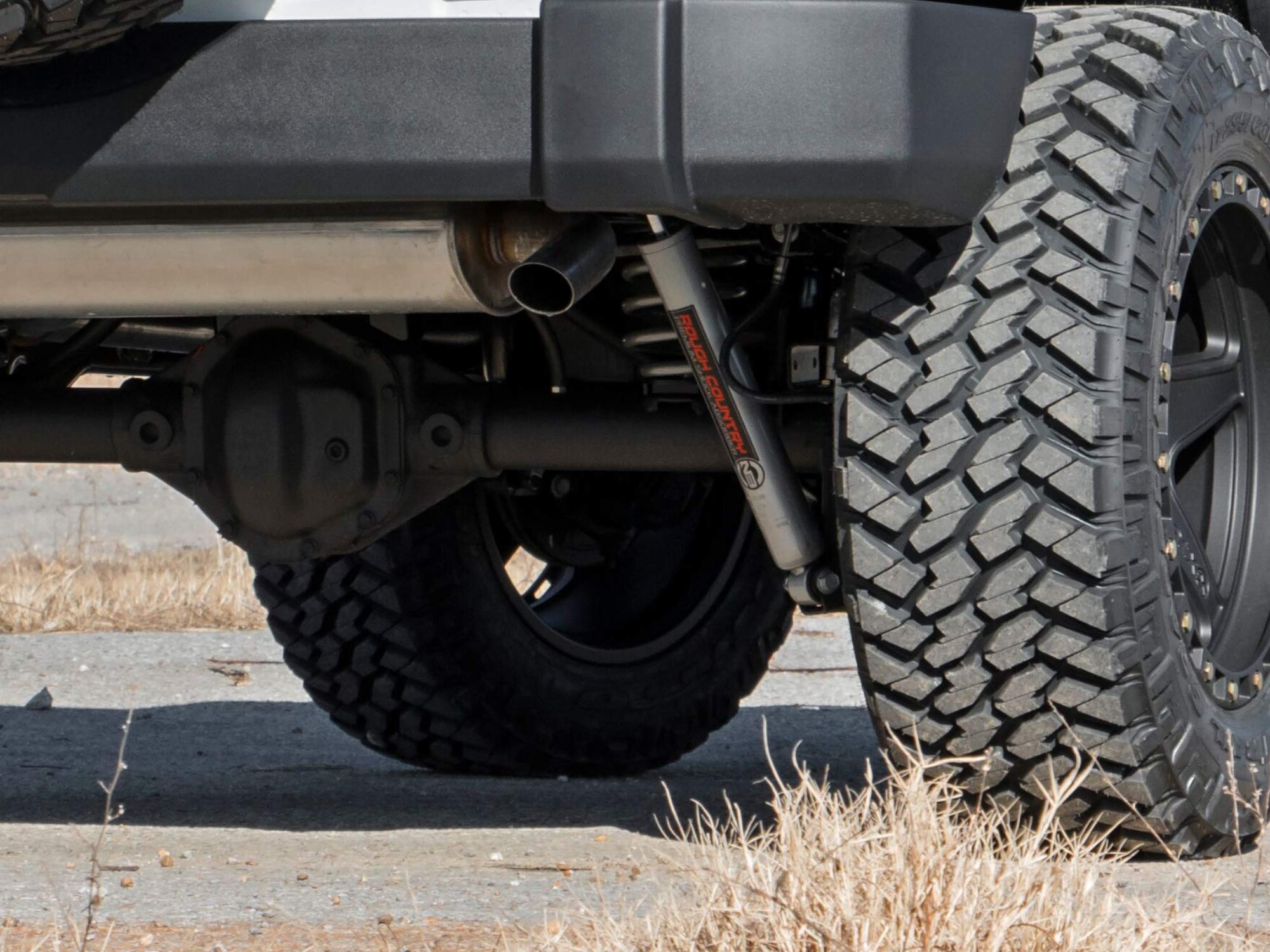 Rough Country 23144-A rear shock assembly showcases rugged construction and components
