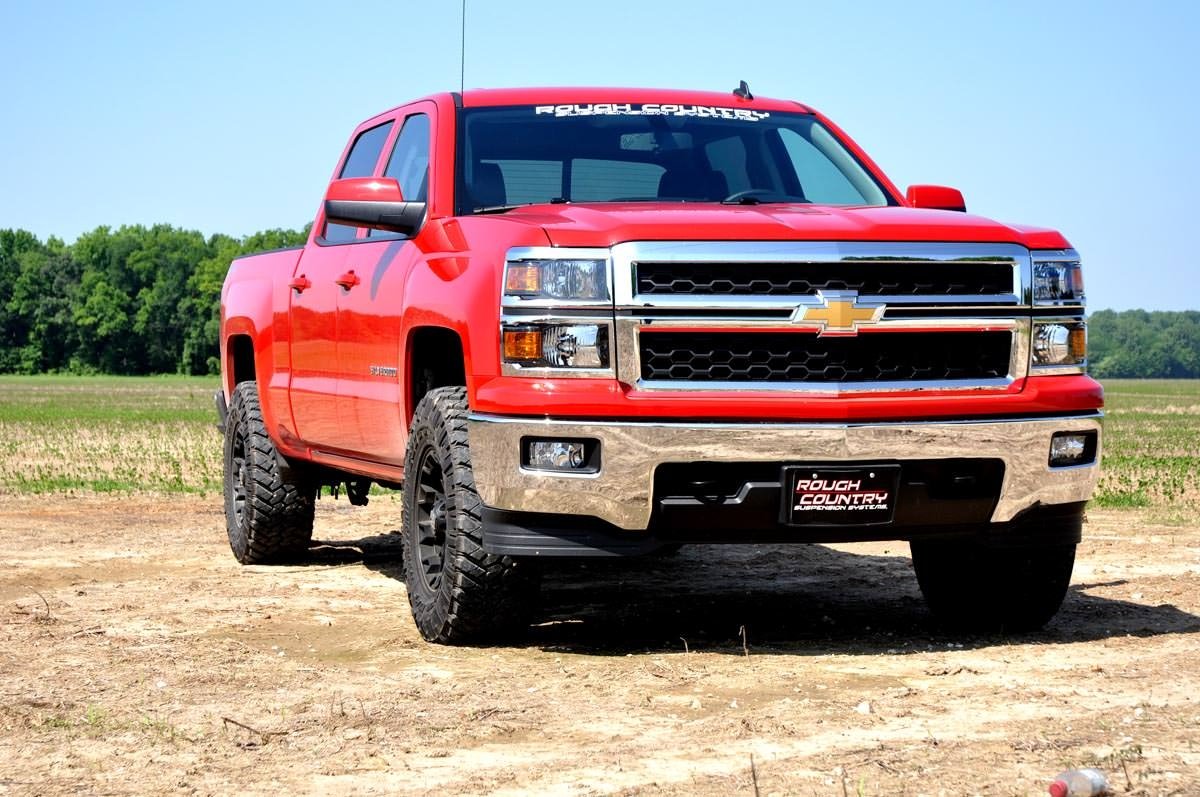 Rough Country red anodized leveling kit finish adds rugged visual appeal.