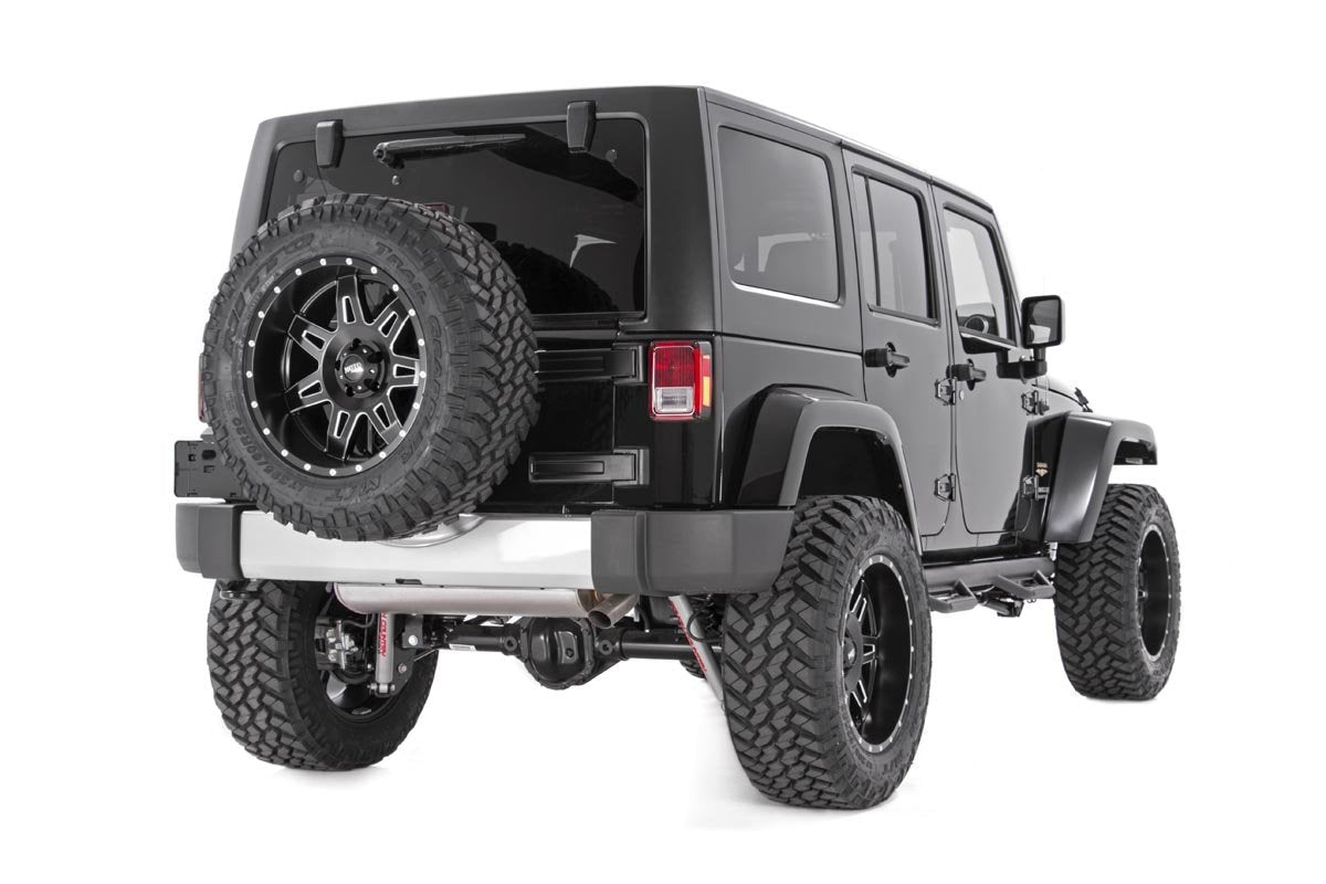 Bolt-on installation view of Rough Country spacer on Wrangler.
