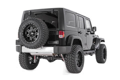 Bolt-on installation view of Rough Country spacer on Wrangler.