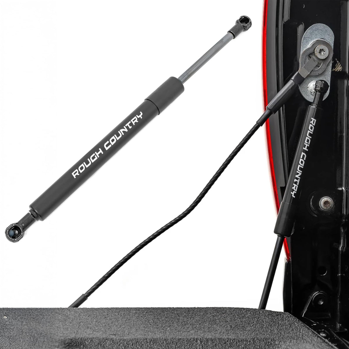 Rough Country tailgate assist on driver-side mount showing smooth release
