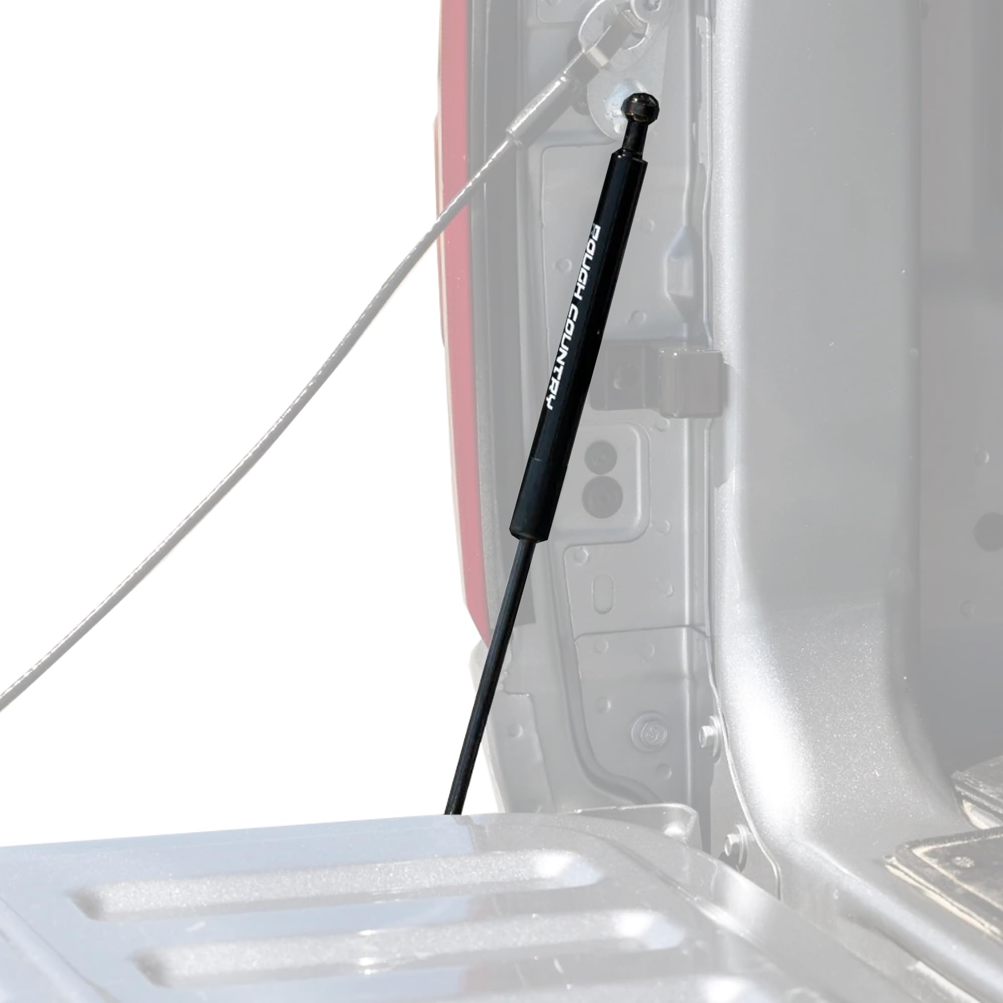 Rough Country tailgate assist mounted on Ram 1500 with driver-side pull handle for safe lowering