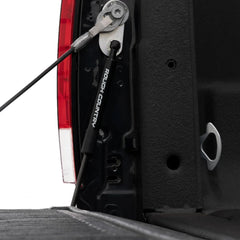 Rough Country tailgate assist demonstrates one-handed operation during lowering