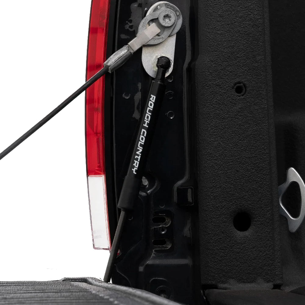 Rough Country tailgate assist shown during smooth descent with controlled lowering