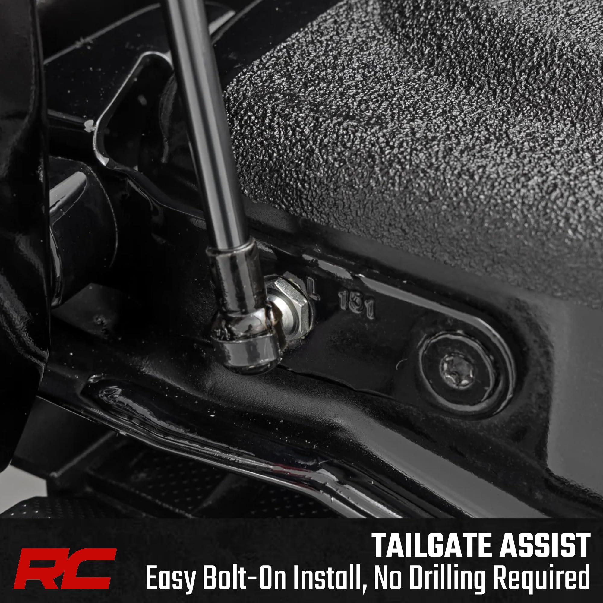 Rough Country tailgate assist in action with handle pull