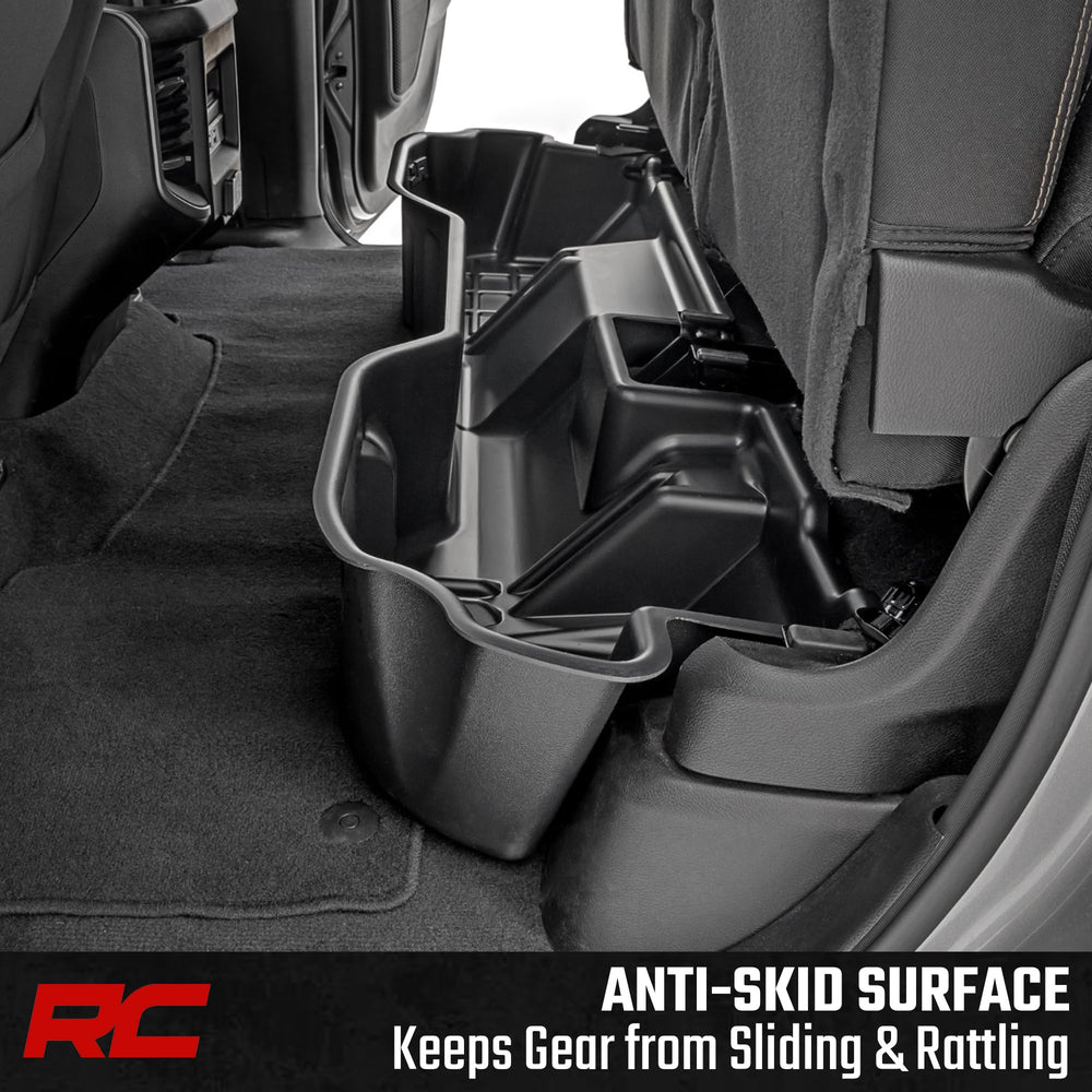 Durable thermoplastic under-seat tray resists daily wear and holds tools and gear.