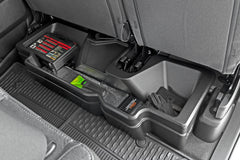 Rough Country under-seat storage in Ram 1500 Crew Cab, side view showing compact integration.