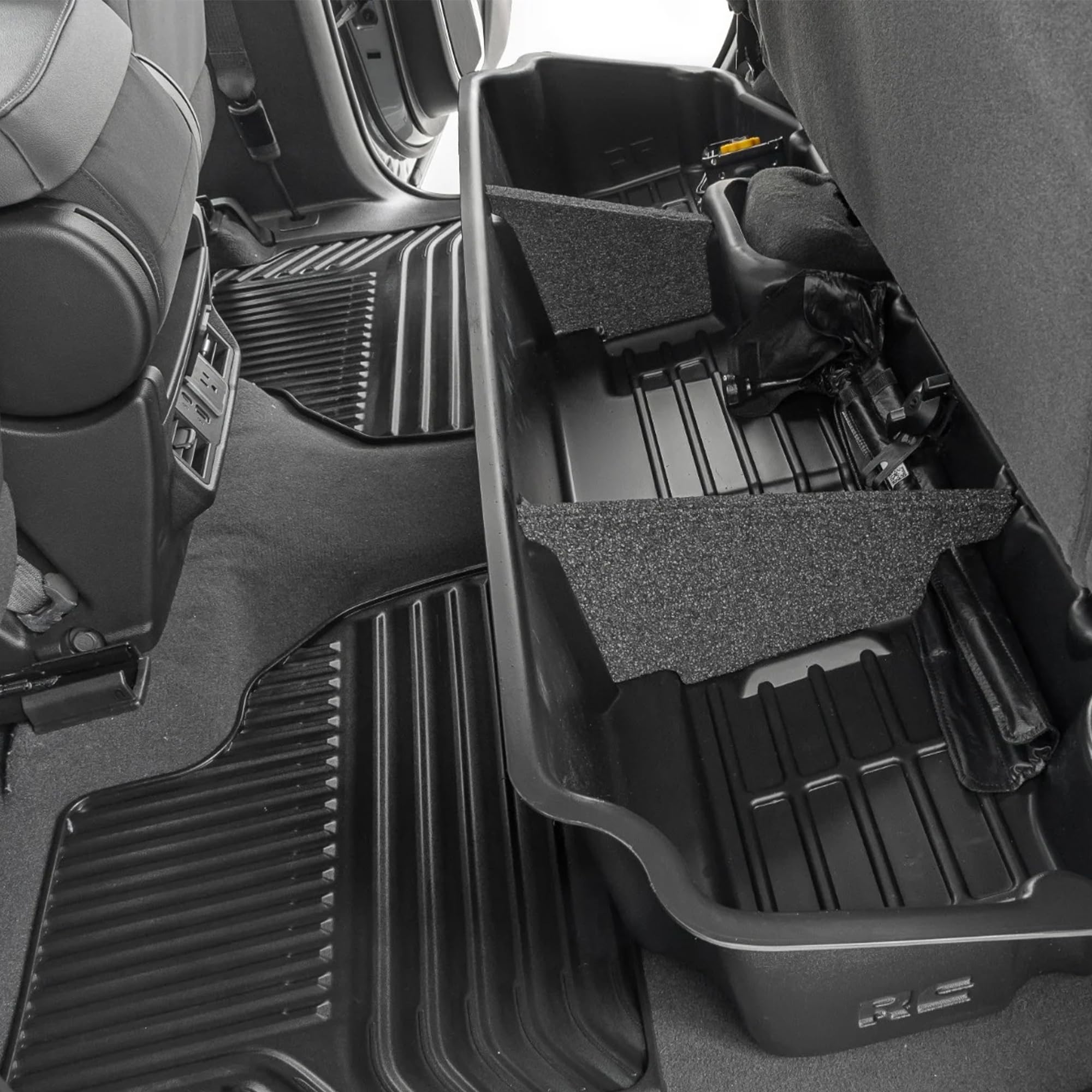 Rough Country under-seat storage for Silverado Double Cab keeps tools within reach and out of sight.