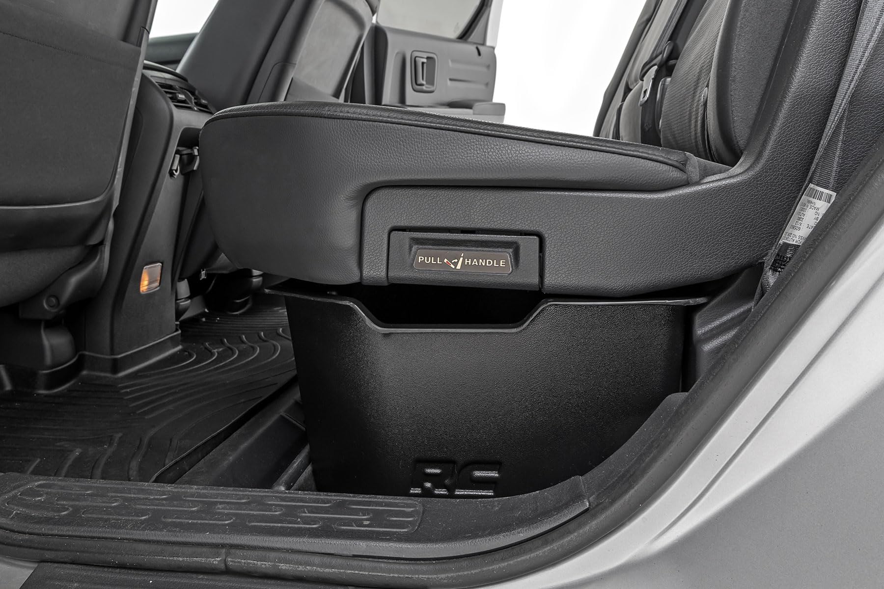 Rough Country under-seat tray: maximized space under rear seats for everyday essentials.