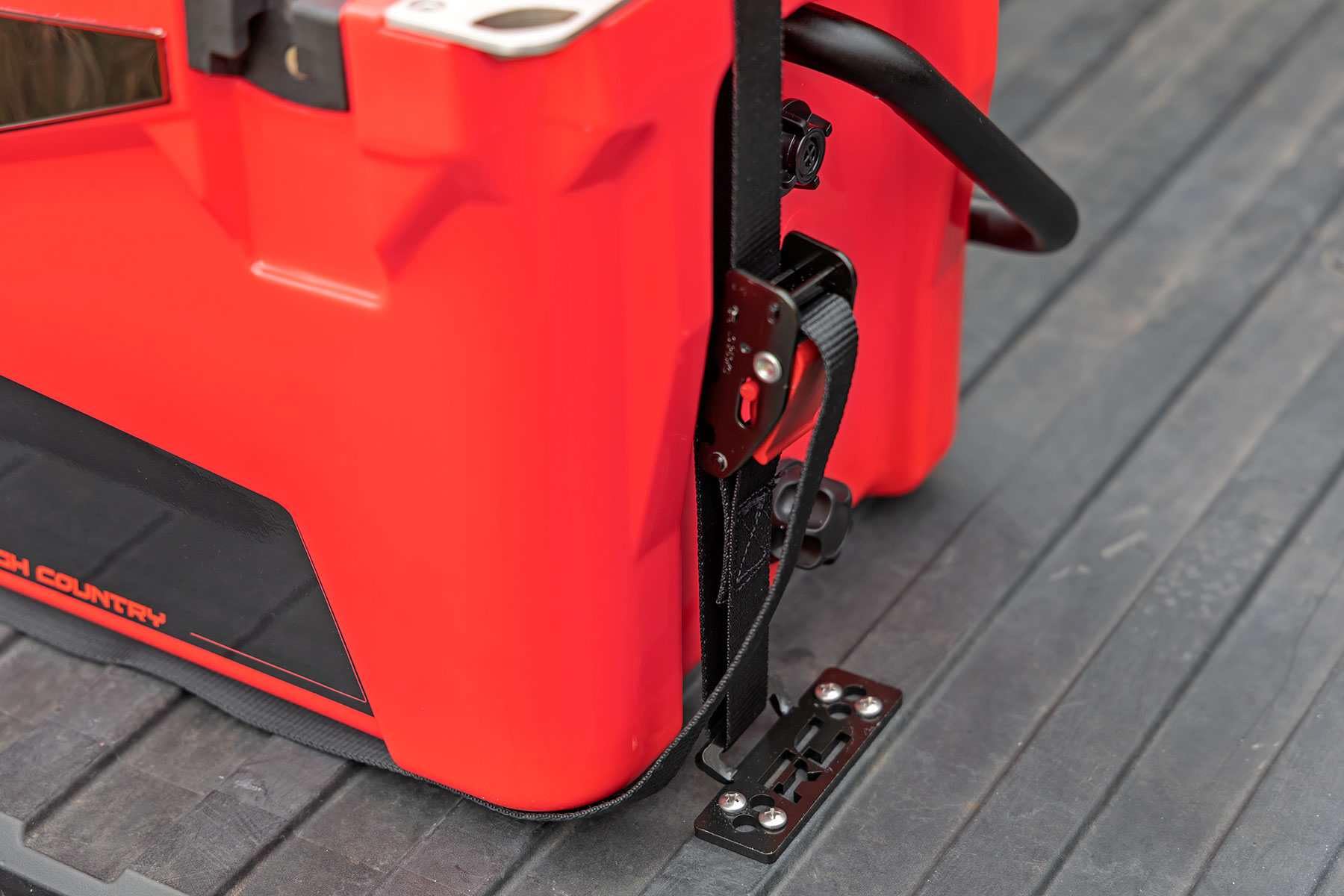 Rough Country cooler tie-down strap closeup, rugged 1in cam strap for secure mounting.