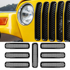 RT-TCZ black honeycomb front grill inserts on Jeep Wrangler TJ for rugged, rust-free upgrade.