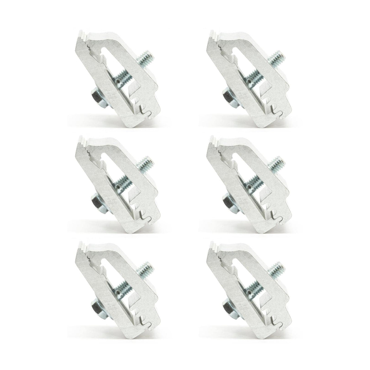 RuggedXL Low Pro aluminum mounting clamps securing camper to truck bed for stability