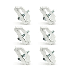 RuggedXL Low Pro aluminum mounting clamps securing camper to truck bed for stability