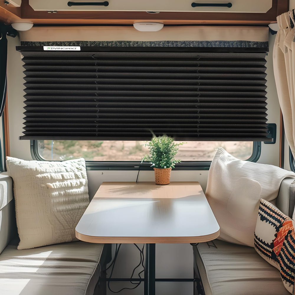 Compact 38x24 RVINGPRO blinds covering a standard camper window